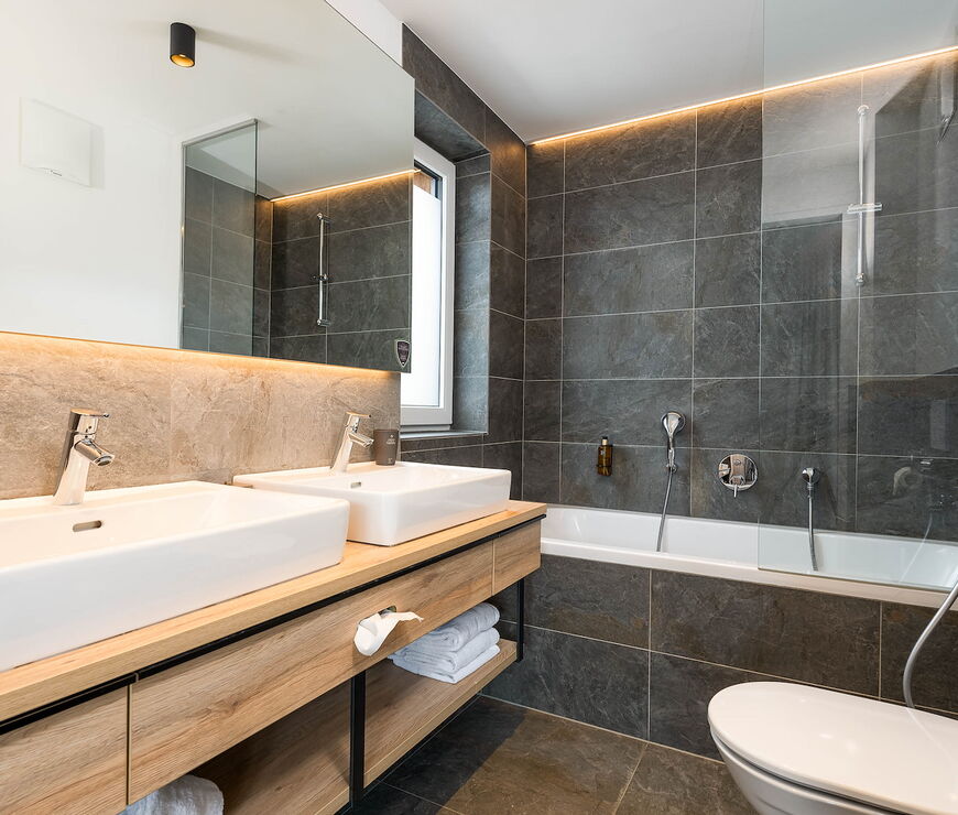 Stockinggut by AvenidA | 1-Schlafzimmer Suite mit Badewanne