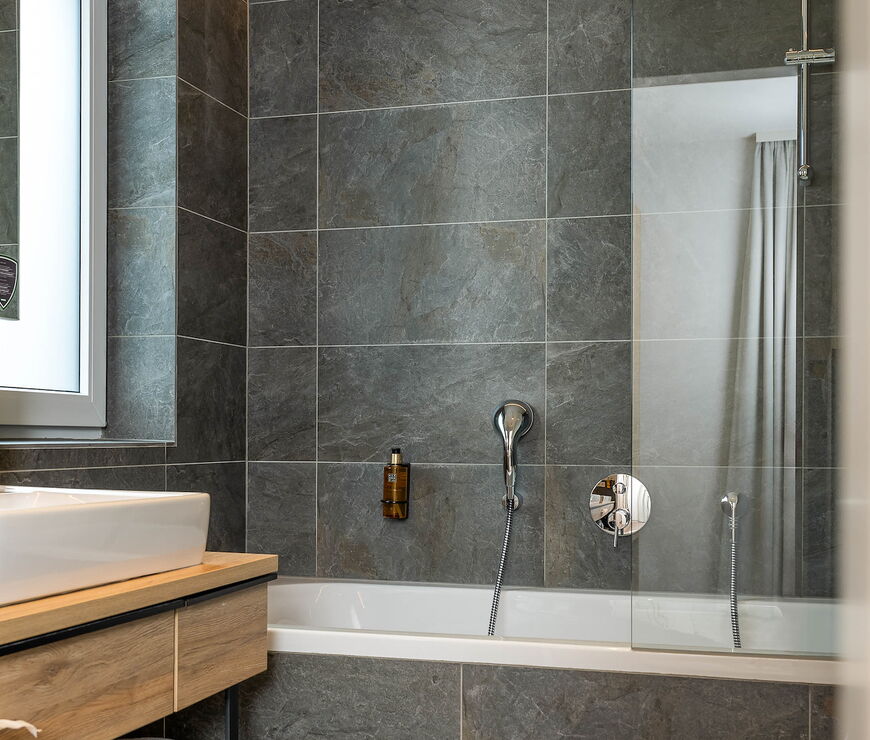 Stockinggut by AvenidA | 1-Schlafzimmer Suite mit Badewanne